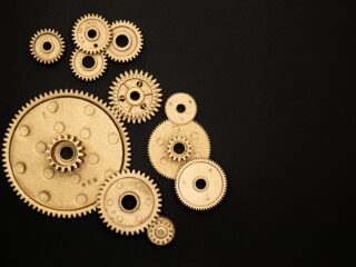 Collection of mechanical gears on a black background